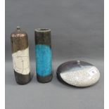 Collection of studio pottery to include two cylindrical vases and another of flattened form, incised