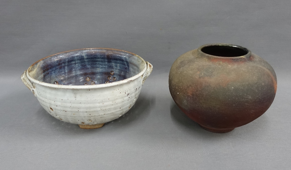 Lead fired earthenware pot and a studio pottery colander type bowl, (2)