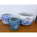 Three various Chinese blue and white fish bowl style planters, largest 30 x 48cm (3)