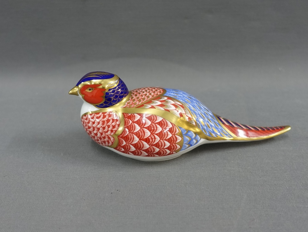 Royal Crown Derby bone china Imari pattern bird, with red printed backstamp, 18cm long