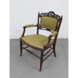 Late 19th / early 20th century open armchair with pierced top rail, upholstered back, arms and