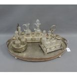 Epns condiment and bottle stands together with an oval tray with pierced gallery, (a lot)