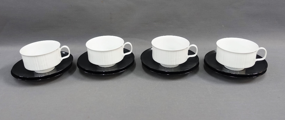 Rosenthal coffee cups and saucers to include four white glazed cups and six black glazed saucers, by