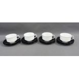Rosenthal coffee cups and saucers to include four white glazed cups and six black glazed saucers, by