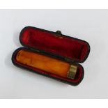 Amber cheroot with yellow metal mount, with leather case