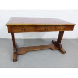 19th century mahogany library writing table, the moulded rounded rectangular top with red skivver