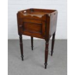 19th century mahogany bedside cabinet / pot cupboard, with three quarter gallery top and on turned