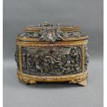 19th century relief moulded brass and copper casket, likely French, with hinged lid and silk lined