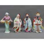 A collection of Chinese porcelain standing figures to include Long Life, Happiness & Success,