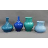 A collection of Pilkingtons Royal Lancastrian blue and green glazed pottery to include four vases of