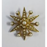 9ct gold and seed pearl star burst brooch, stamped 375 with London hallmarks, approx 8.5g