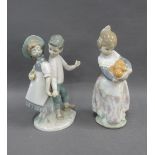 Lladro figure of a girl with a basket of oranges and another figure, tallest 17cm (2)