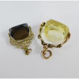 9ct gold citrine fob together with another with unmarked yellow metal mounts, (2)