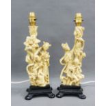A pair of chinoiserie faux ivory moulded resin figural table lamp bases with shades, size