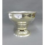 Swedish planished silver bowl with leaf and grape pattern, on a spreading circular footrim, 24 x
