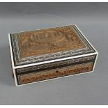 Indian sandalwood box, the hinged lid with micro mosaic type border and carved pattern of buildings,