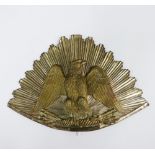 White metal cap badge with a brass / bronze eagle motif, 24 x 15cm