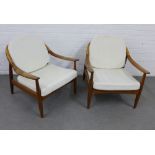 A pair of mid century armchairs with spindle backs, curved arms and removable cushions, 74 x 70cm (