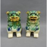 Pair of green glazed pottery Temple lion / dogs, 15cm high (2)
