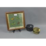 Victorian 4" brass salmon fishing reel by Farlow & Co of London and a frame containing four coloured