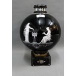 19th century black glass vase with white pate sur pate style classical figures,on a square