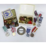 Ten various medals to include a Polish Service medal for Prison Guards, various military brass