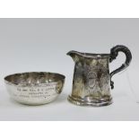 Eastern silver bowl, stamped 800, 11cm wide together with a white metal cream jug, (2)