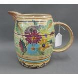Denby jug painted with flowers and coloured bands, 19cm high