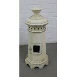 Painted clay garden smoker/ lighthouse, with a small door to the base and pierced gallery to top,