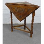 Oak triangular table with a carved drop leaf and turned legs , 69 x 67cm