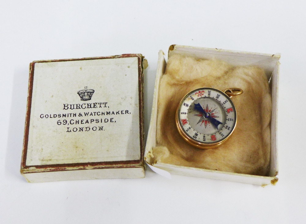 18ct gold mounted barometer and compass pendant, stamped 18ct, 3cm diameter, with a Burchett