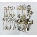 A large collection of silver teaspoons to include various Georgian and Victorian hallmarks, a napkin