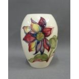 Moorcroft vase tubeline decorated with flowers, with facsimile signature and impressed factory mark,