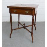 Mahogany envelope table, with a single frieze drawer, fluted legs and cross stretcher with an urn