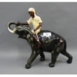 Early to mid 20th century painted plaster Elephant and rider, 32cm long