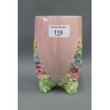 Clarice Cliff for Wilkinson's Pottery pink glazed vase on three floral moulded feet, 15cm high