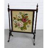 Mahogany fire screen with a floral tapestry panel, 76 x 56cm