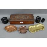 Pine box containing three copper ashtrays, brass dish, two ebony wooden hair tidy boxes etc, (a lot)