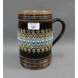 Doulton Lambeth tankard with brown glazed body and band of corn flowers, with impressed factory