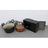 Mixed metal wares to include a black metal cauldron, copper kettle, black metal bracket, and a magic