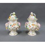 Coalbrookdale by Coalport, a pair of floral encrusted porcelain vases with covers, 15cm high (2)