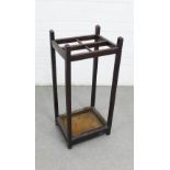 Stained pine stick stand with four divisions and with original metal drip tray, 69 x 30cm