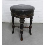 Victorian adjustable piano stool with leather upholstered circular seat,