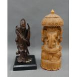 Ganesh a carved wooden figure / shrine, together with a hardwood figure of a Sage, tallest 23cm (2)