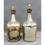 Pair of silvered glass table lamps, one with a amp cartouche decoupage 'Nova Granada, California',