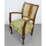French style open armchair with canework back, scrolling arms, upholstered seat and cabriole legs,