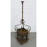 Late 19th / early 20th century brass hanging lantern with four coloured leaded glass panels, 116 x