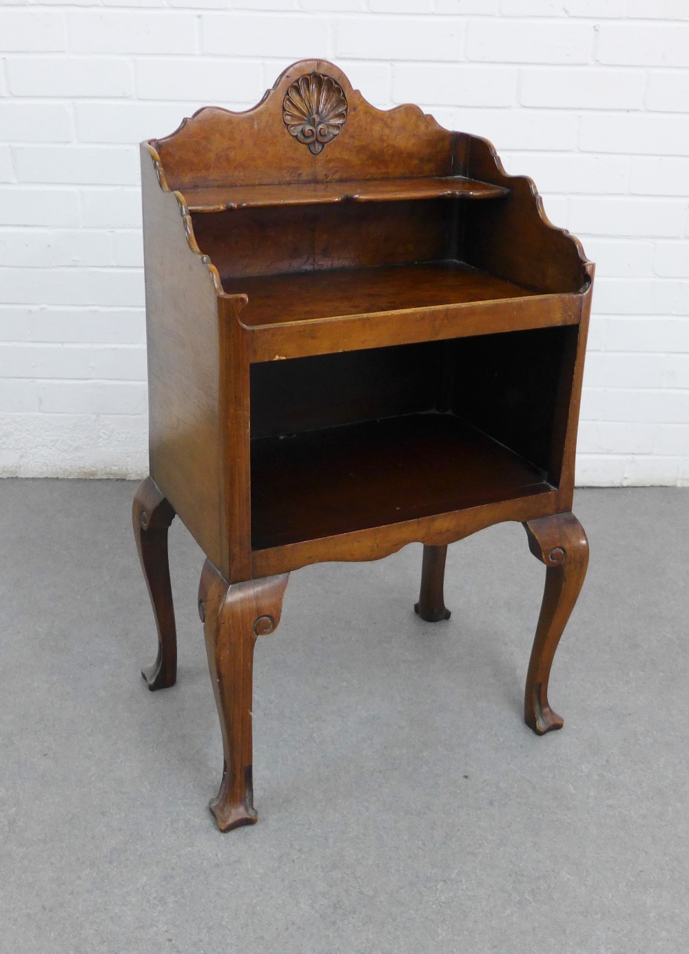 Queen Anne style burr walnut cabinet, with a shell ledgeback and open alcove, on cabriole legs, 86 x