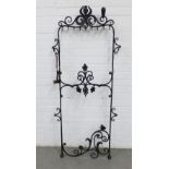 Late 19th / early 20th century ironwork window guard, with scrolling foliage and flower pod, owl and