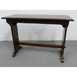 Mahogany occasional table with rectangular top and trestle side supports, 78 x 107cm